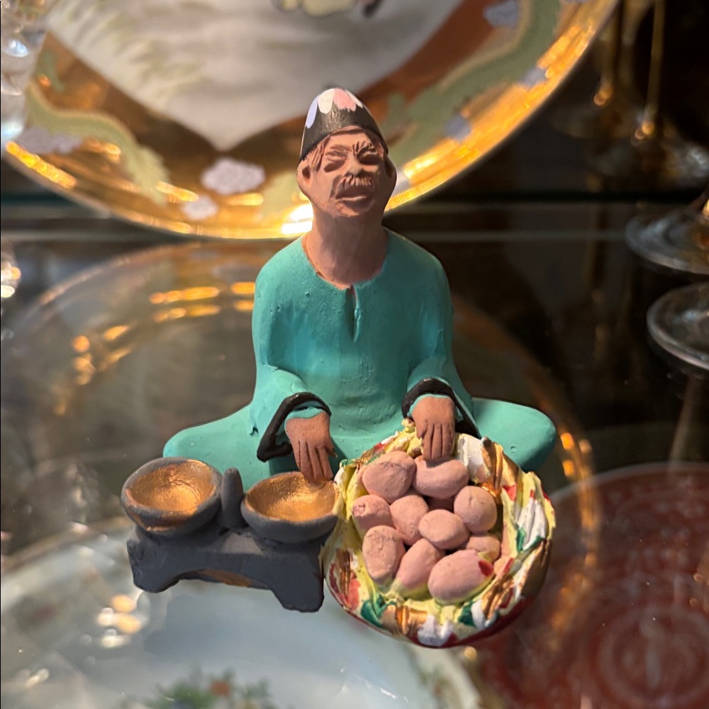 Egyptian Handcrafted Potter Figurine with Gold and Green Accents